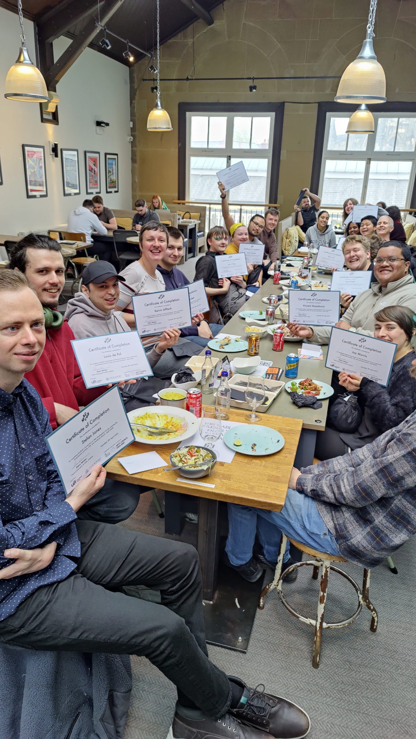 A group of people with certificates