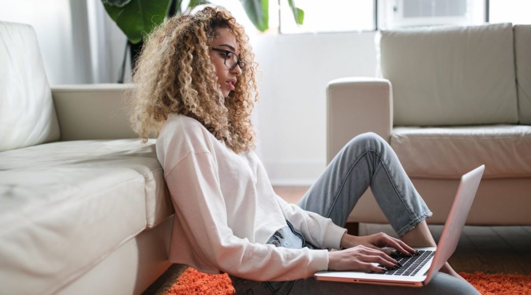 woman on laptop in home