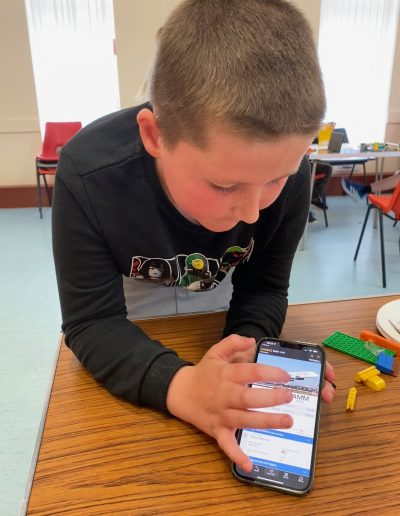 Young boy with mobile phone