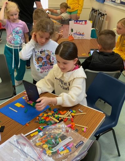 Young girls looking at a digital tablet